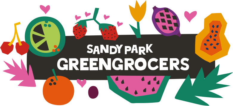 The Sandy Park Greengrocers logo - This images shows a selection of colourful fruits surrounding the text of the Sandy Park Greengocers logo which is shown in white against a dark grey background. The fruit looks as though it is dancing and there are love hearts coming out form the fruit.